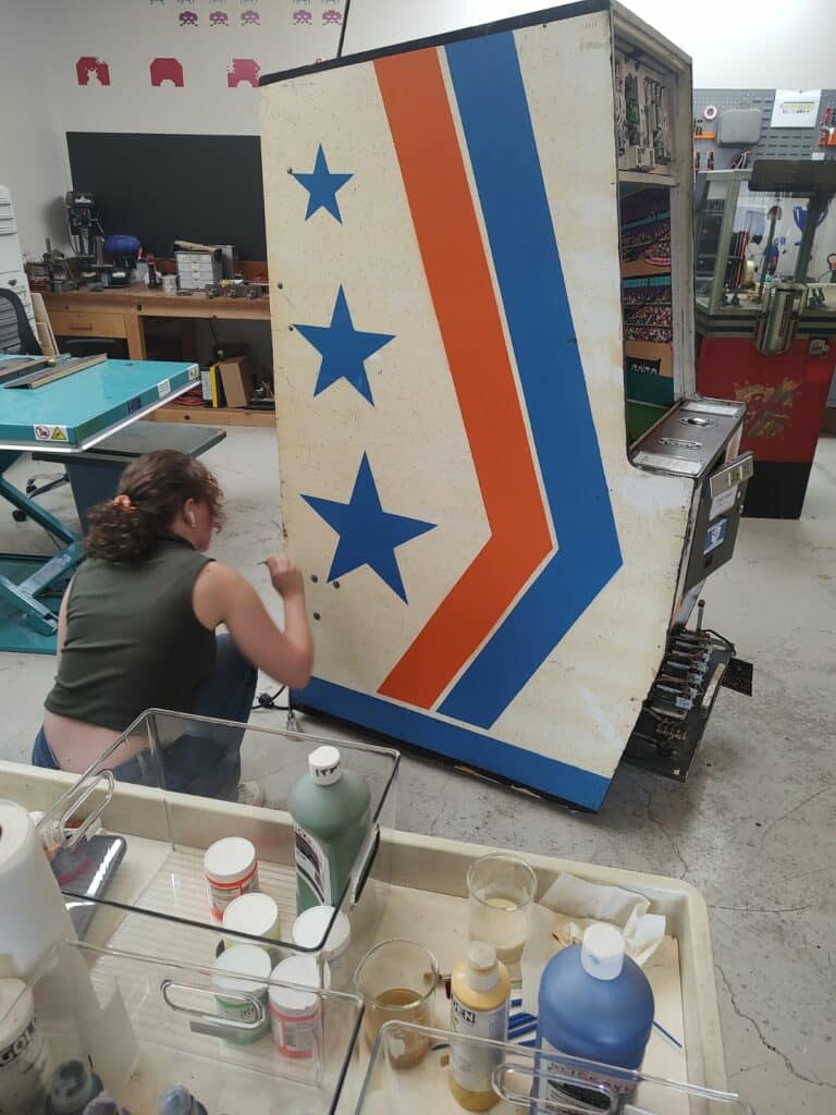 Inpainting or retouching on arcade cabinet