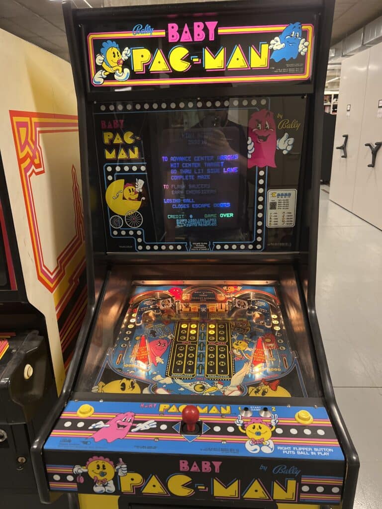 Baby Pac-Man (Bally Midway, 1982), a hybrid device between an arcade terminal and a pinball machine